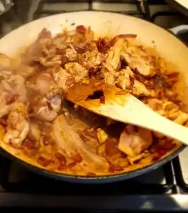 chicken browning in the pan