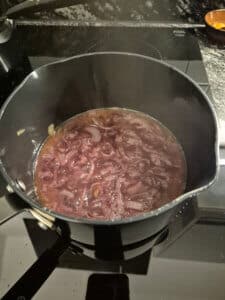 Red wine reducing in the pan