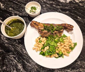 Serve Barnsley chops with the white beans & spring greens