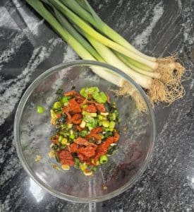Stuffing mix using baby leeks and sun dried tomatoes