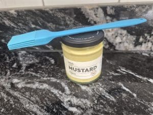 Coat racks in a dijon mustard