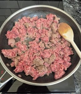 Browning lamb mince in a pan