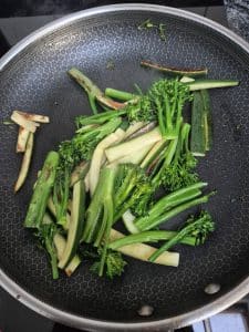 Courgette and broccoli in the pan