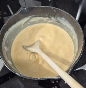 Cheese sauce in pan
