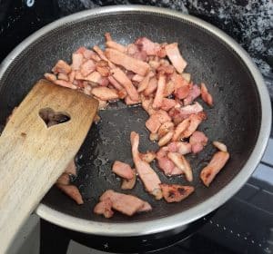 Frying bacon in a pan
