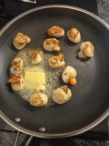 Scallops in the pan Ive just added butter