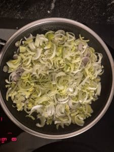 Sweating down the leeks and shallots