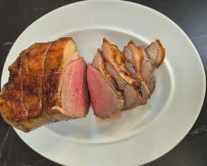 Beef rested and sliced, served medium rare
